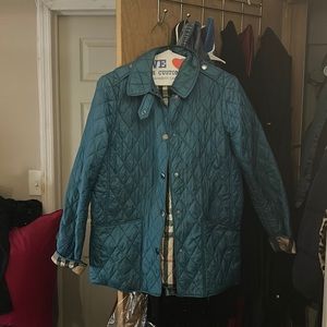 Turquoise quilted Burberry authentic jacket .
